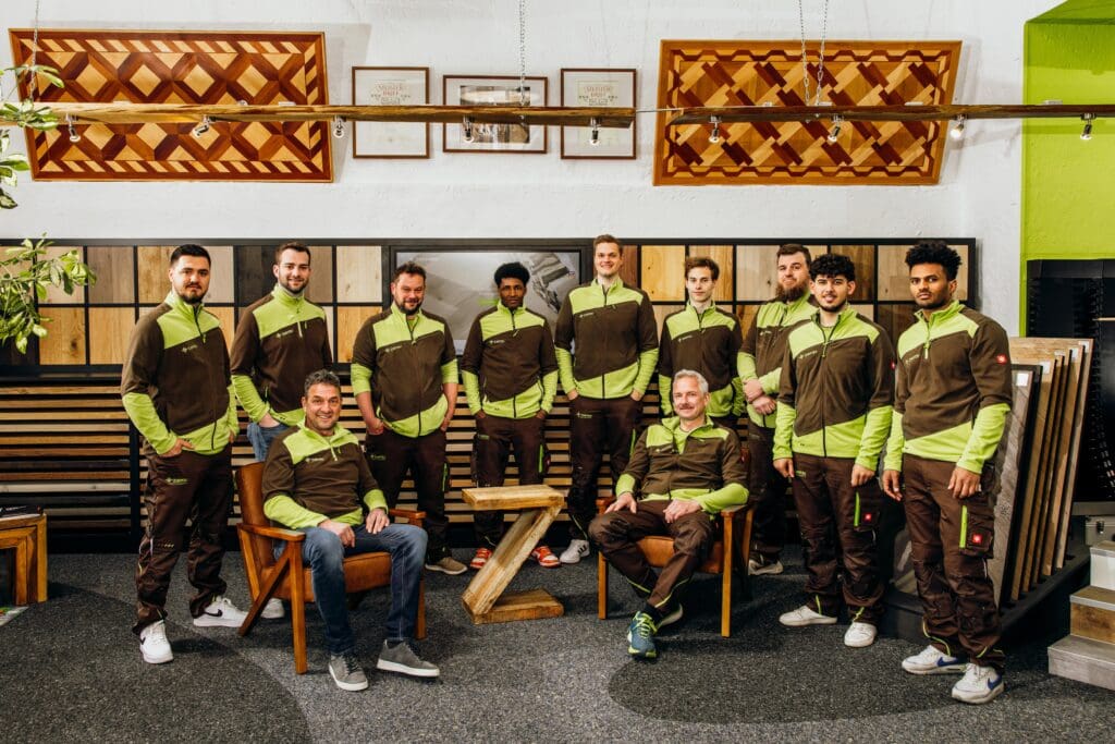 Team von Zierau Parkett in der Ausstellung in Aschheim
